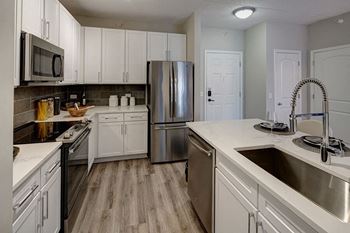 Kitchen With Ample Storage at The MilTon Luxury Apartments, Vernon Hills